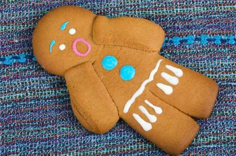 Scared gingerbread man on a table Stock Photos