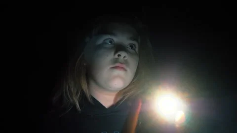 scared girl in the dark