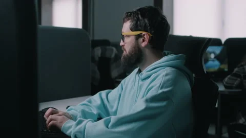 Scared IT worker in the office during war Stock Footage 187594957