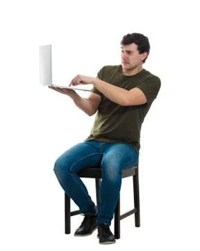 Scared man holding computer Stock Photos