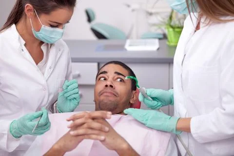 The scared patient at the dentist Stock Photos