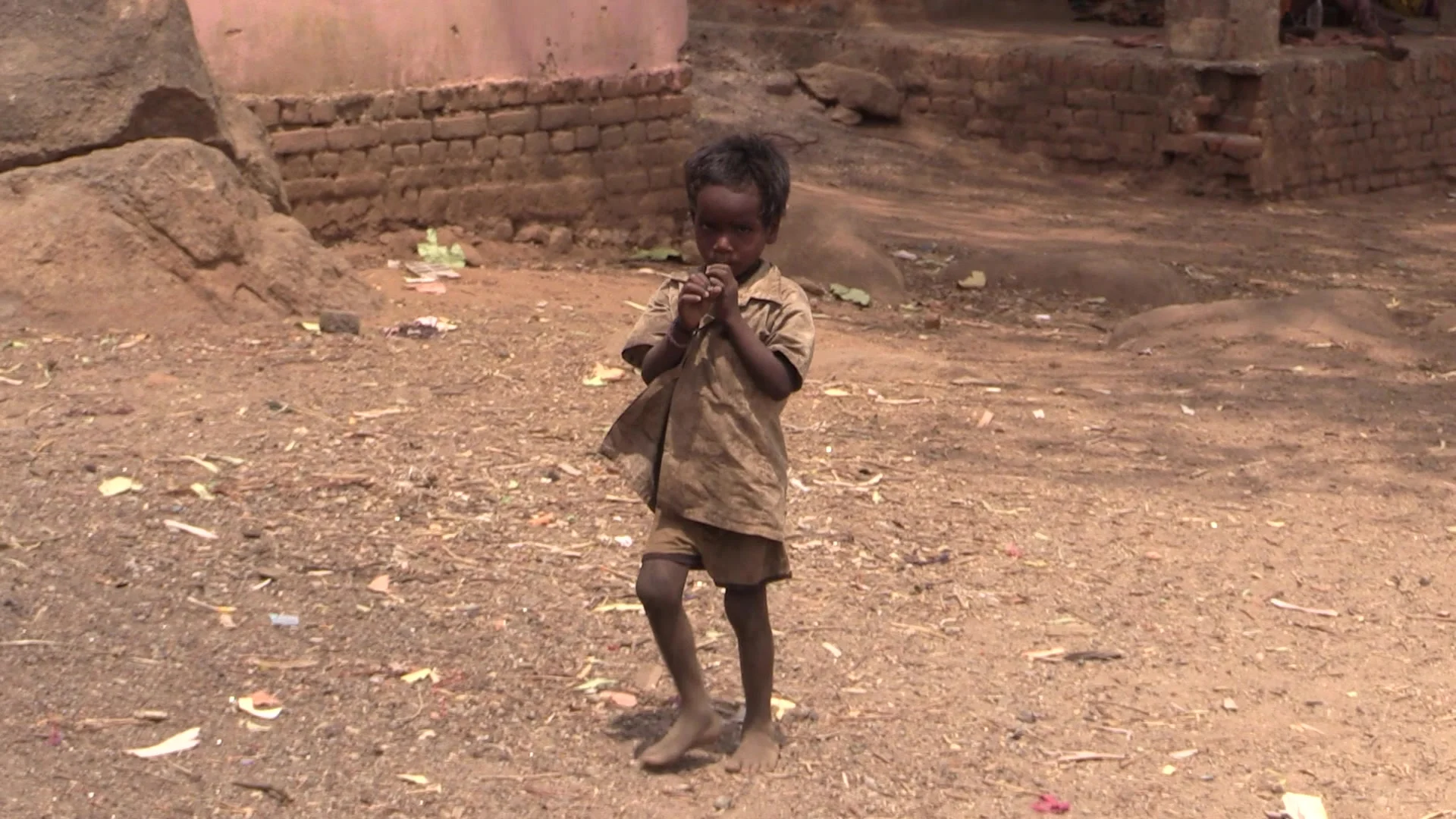 Premium Photo  Poor boy in front of village