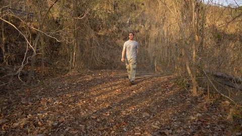 Scared Prepper Walking on Abandoned Road Escaping Coronavirus Pandemic in Cities Stock Footage 126577207