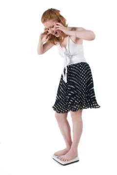 Scared by the scale Stock Photos