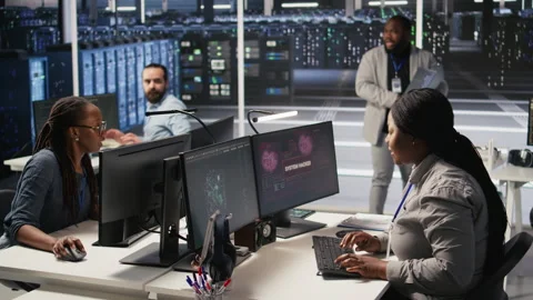 Scared server room technician responding to hacking attack, requesting help Stock Footage 309630818