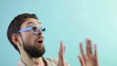 Scared terrified bearded man waving hands and saying no Stock Footage 124682764