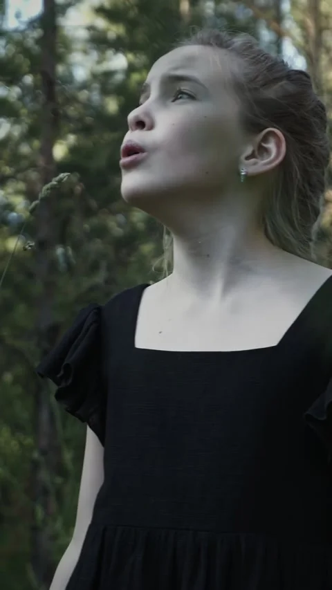 Scared young girl calling for help lost in the woods Stock Footage 341446388