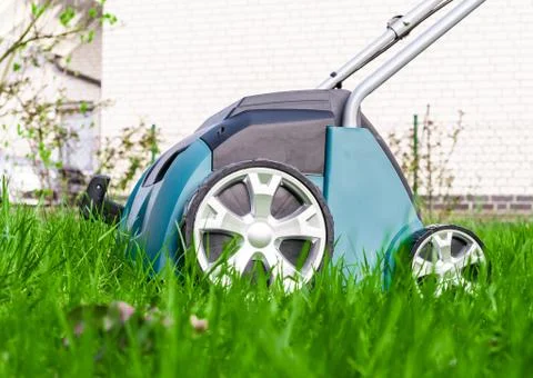 Scarifier Work into the garden. Stock Photos
