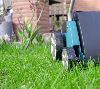 Scarifier Work into the garden. Stock Photos