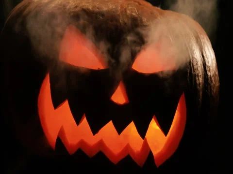Scary carved halloween pumpkin in hot burning hell fire flames. The big Stock Footage 80137853