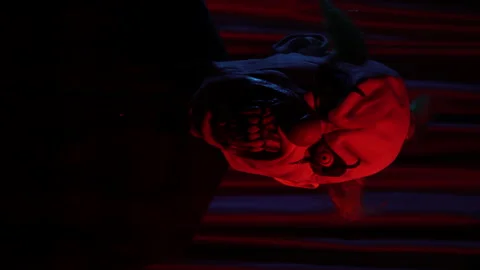 Scary clown in front of camera horror concept vertical video Stock Footage 209187572