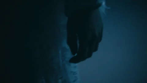 Scary dead Creature Ghost CloseUp Hand walking threw corridors light setup Stock Footage 318955344