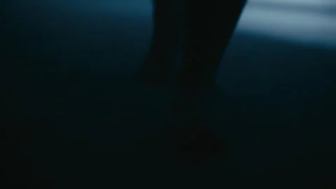 Scary dead Creature Ghost CloseUp Feets walking threw corridors light setup Stock Footage 318955424
