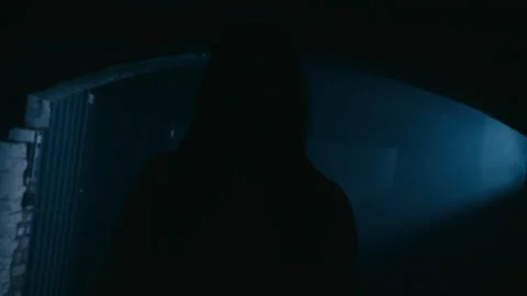 Scary dead Creature Ghost walking threw corridors Helloween style light setup Stock Footage 318956243