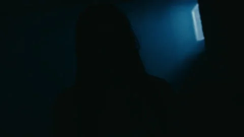 Scary dead Creature Ghost walking threw corridors Helloween style light setup Stock Footage 318956594