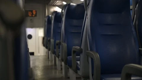 Scary empty wagon of a train, look suspiciously between the seats Stock Footage 124161030