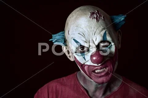 Scary evil clown Stock Photos