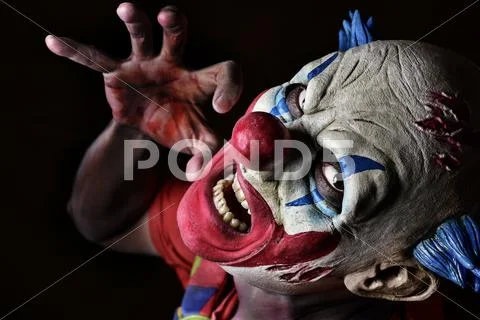 Scary evil clown Stock Photos
