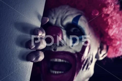 Scary evil clown Stock Photos