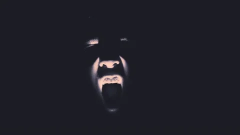 Scream of spooky scary dark horror face Stock Photo