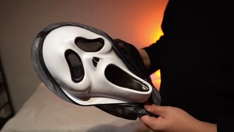 Scary ghost face mask for halloween costume, horror party accessory Stock Footage 318367016