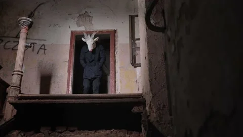 Scary ghost walking out of shadows in a haunted ruined house. Stock Footage 145919991