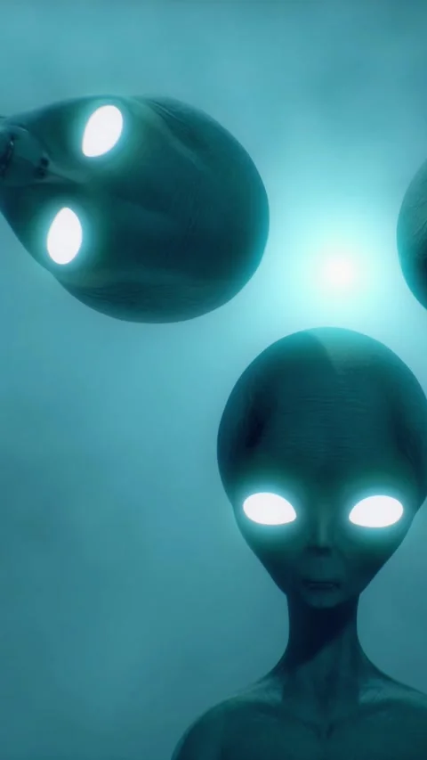 Scary gray aliens looking down at you and blinking against the dark foggy Stock Footage 310963828