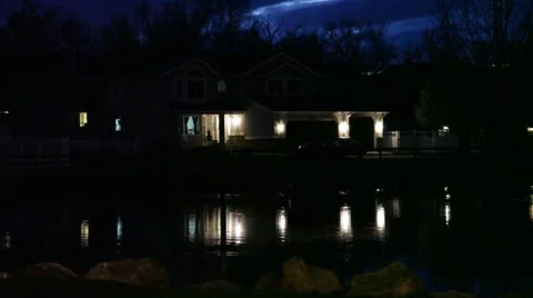 Scary Lake house reflection at night on ... | Stock Video | Pond5