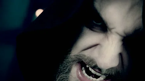 Scary man becoming evil horror extreme closeup Stock Footage 49107817