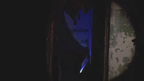 A scary monster attacks people in the dark in an old building, video contains Stock Footage 124245422