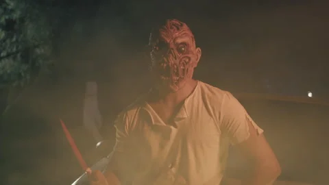 Scary Monster with the Knife Stock Footage 252644128