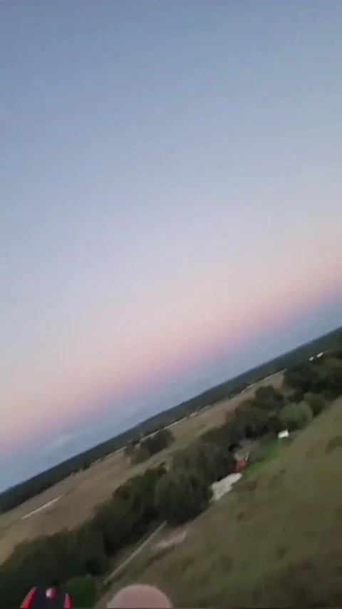 A Scary Paramotor Landing And Quick Thinking Rescuer, Wesley Chapel, Florida, US Video stock 245762514