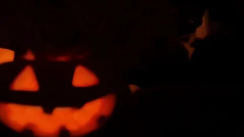 Scary pumpkin faces smiling in the dark scary pumpkin faces smiling in the dark Stock Footage 75993574