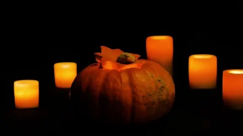 Scary pumpkin faces smiling in the dark scary pumpkin faces smiling in the dark Stock Footage 76053508
