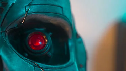Scary red eye of cyborg android robot close-up Stock Footage 301660553