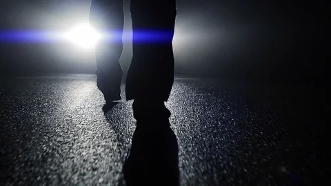Scary silhouette of man at night Stock Footage