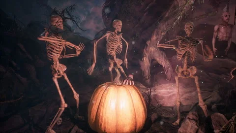 Scary skeletons dancing around a pumpkin on Halloween night in a dark, horrible Stock Footage