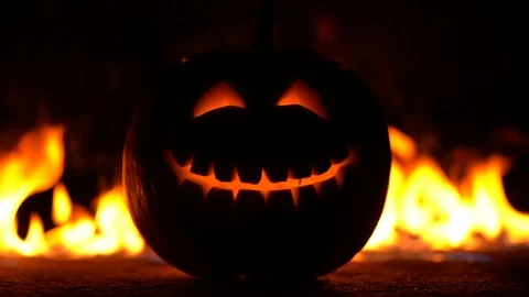 Scary smiling symbol Jack-o-lantern facial expressions on center of frame. Head Stock Footage 94450583