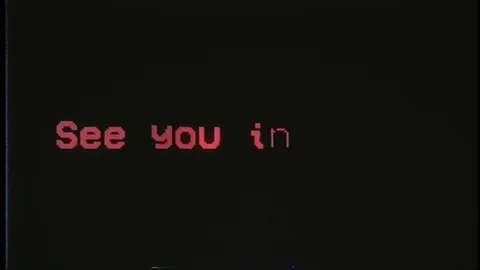 A scary text, See you in hell, appearing on the black screen, typical of a Stock Footage 128968151