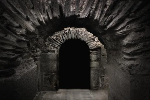 Scary underground, old castle cellar Фото