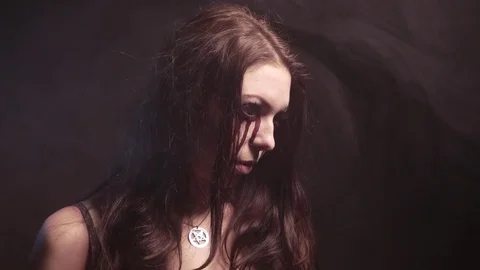 Scary vampire girl looking angry and have a sinister look. 4K UHD Stock Footage