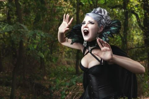Scary witch screams. Stock Photos