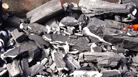 Scatter ashes and fire mixed with smoke in the wind from the hot coals Stock Footage 68082394