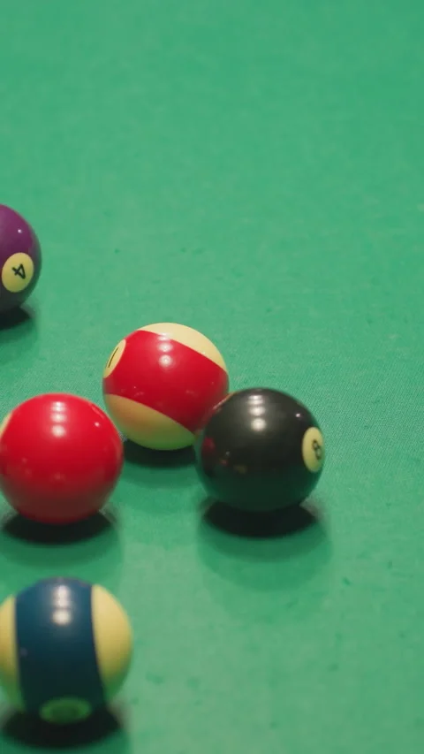 Scattered Billiard Balls on Green Pool Table After Powerful Break Shot Stock Footage 319801468