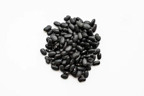 Scattered black beans Stock Photos