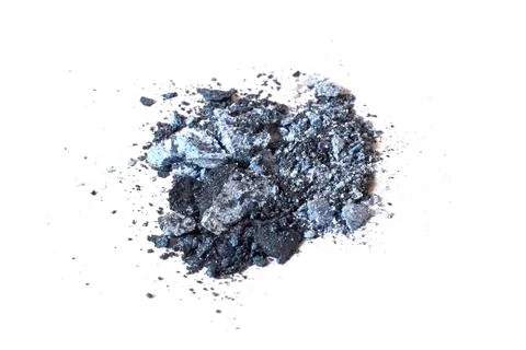 Scattered blue eye shadow isolated on a white background Stock Photos