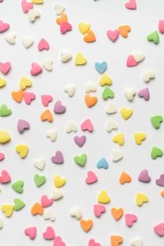 Scattered candy hearts Stock Photos
