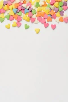 Scattered candy hearts Stock Photos