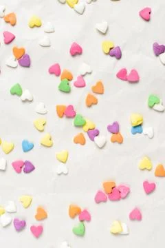 Scattered candy hearts Stock Photos