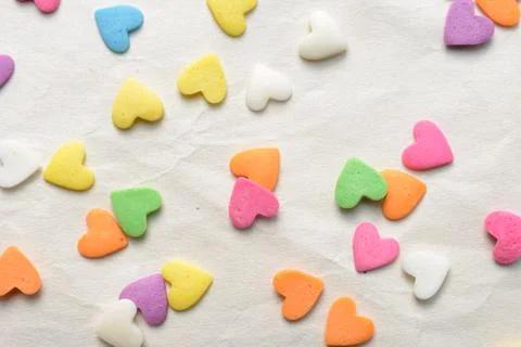 Scattered candy hearts Stock Photos